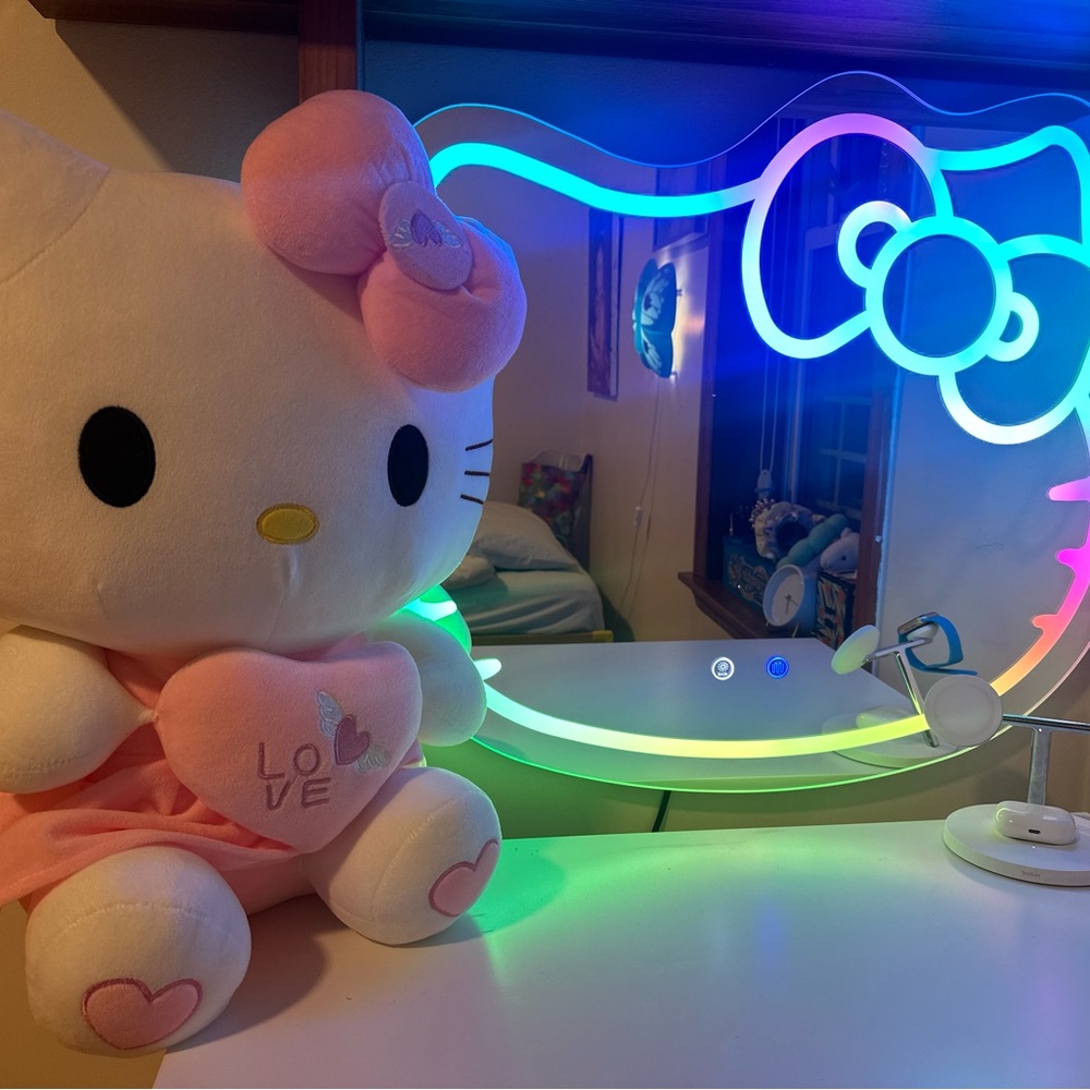 Hello kitty mirror & plush new only mirror 250 plush 50$ I have 10 in stock